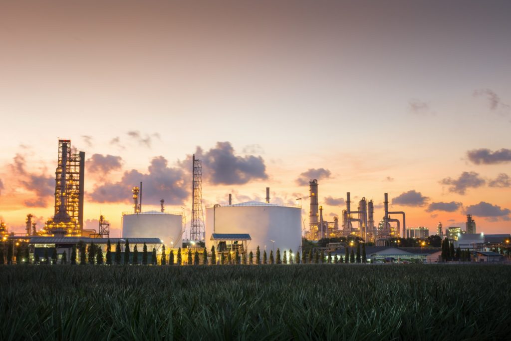 Natural Gas storage tanks and oil tank in industrial plant in the morning