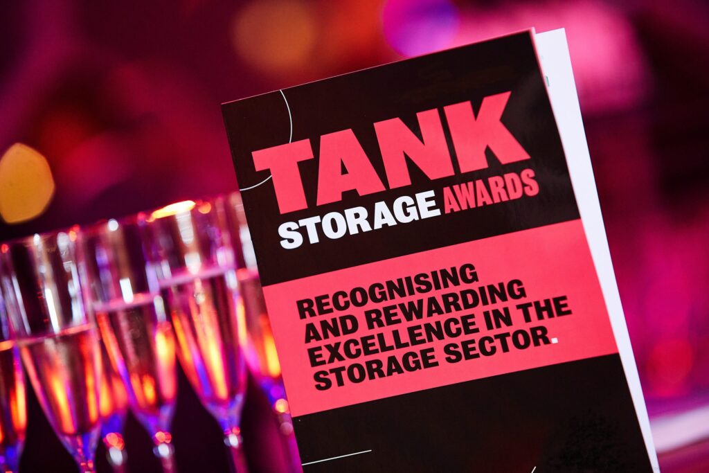 Tank Storage Awards programme in front of waiting champagne flutes