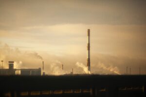 A smoke stacks and a factory