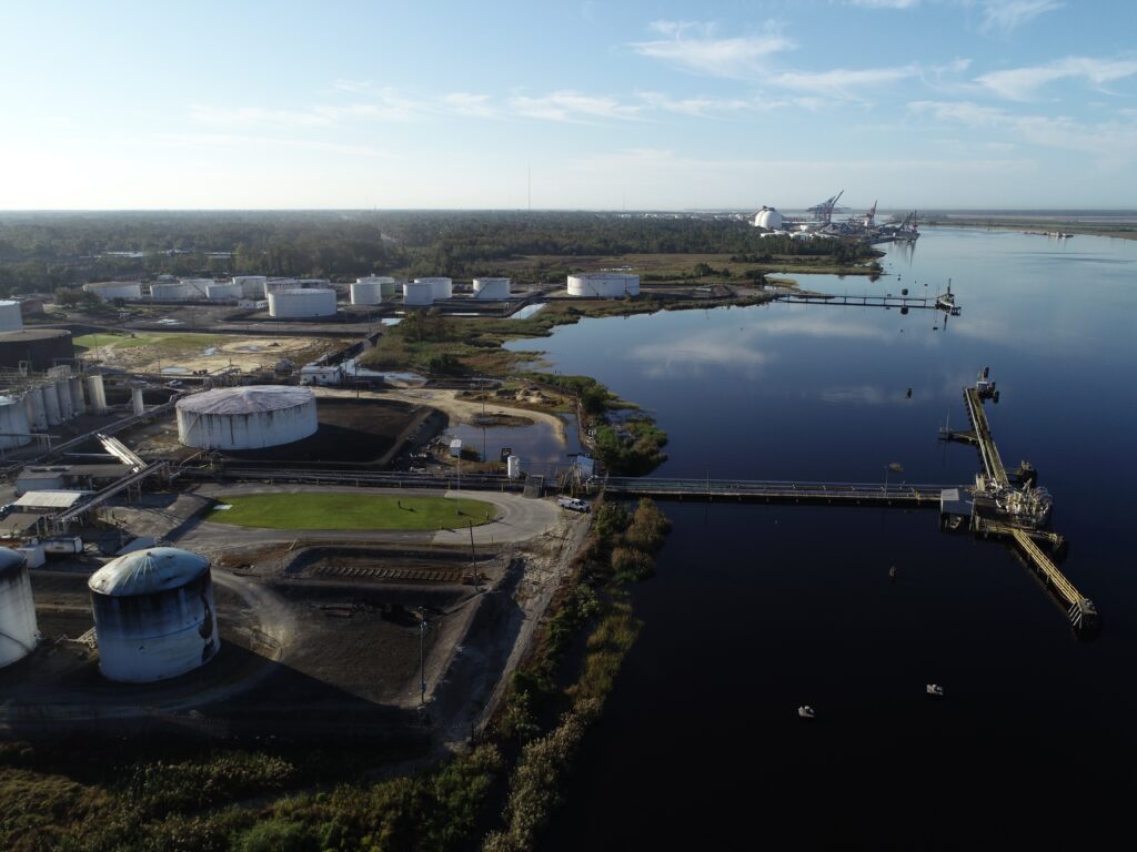 A tank next to a body of water