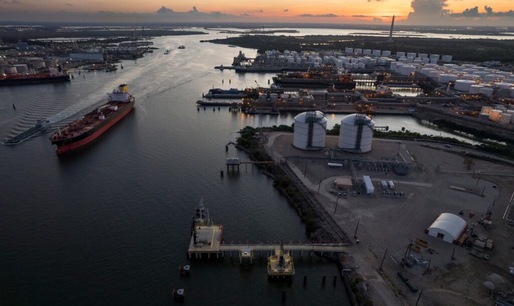 a port with ships and a sunset