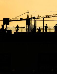 Outline of workers on a site