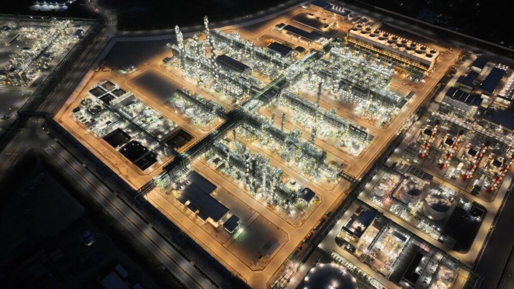 An aerial view of a factory at night