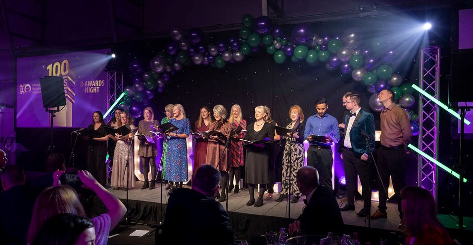 A group of people on stage
