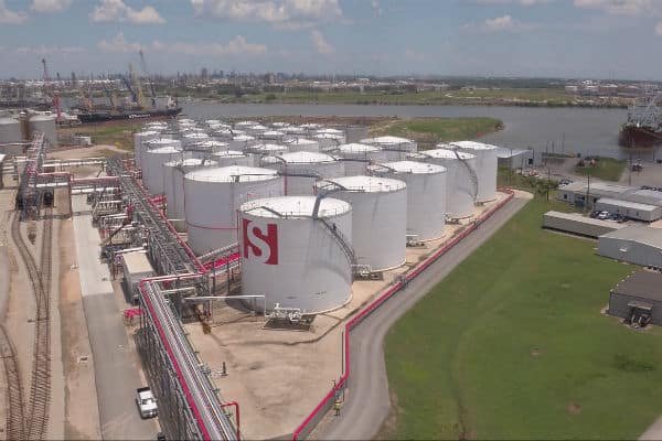 View of white tanks with red S on them