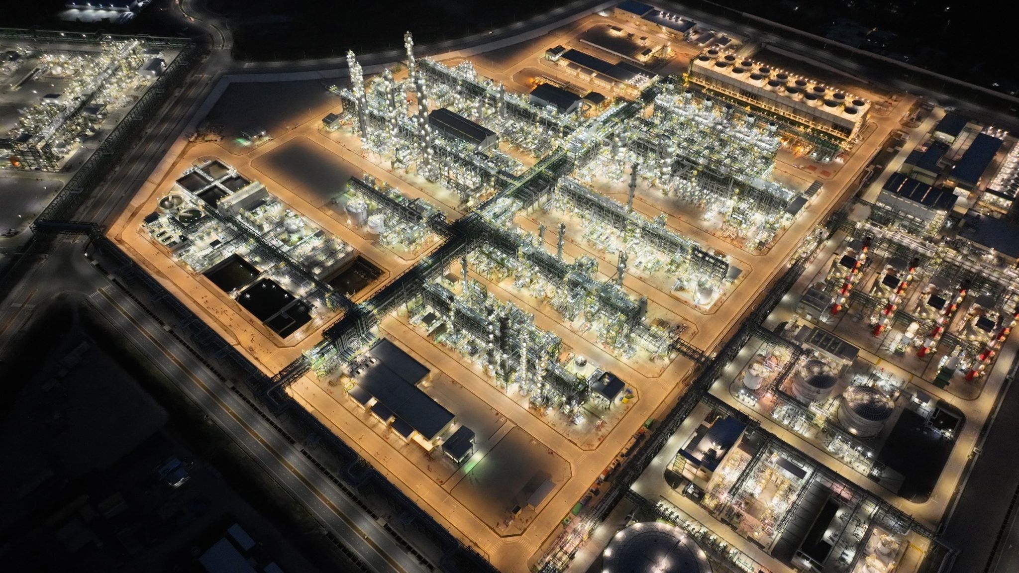 An aerial view of a factory at night