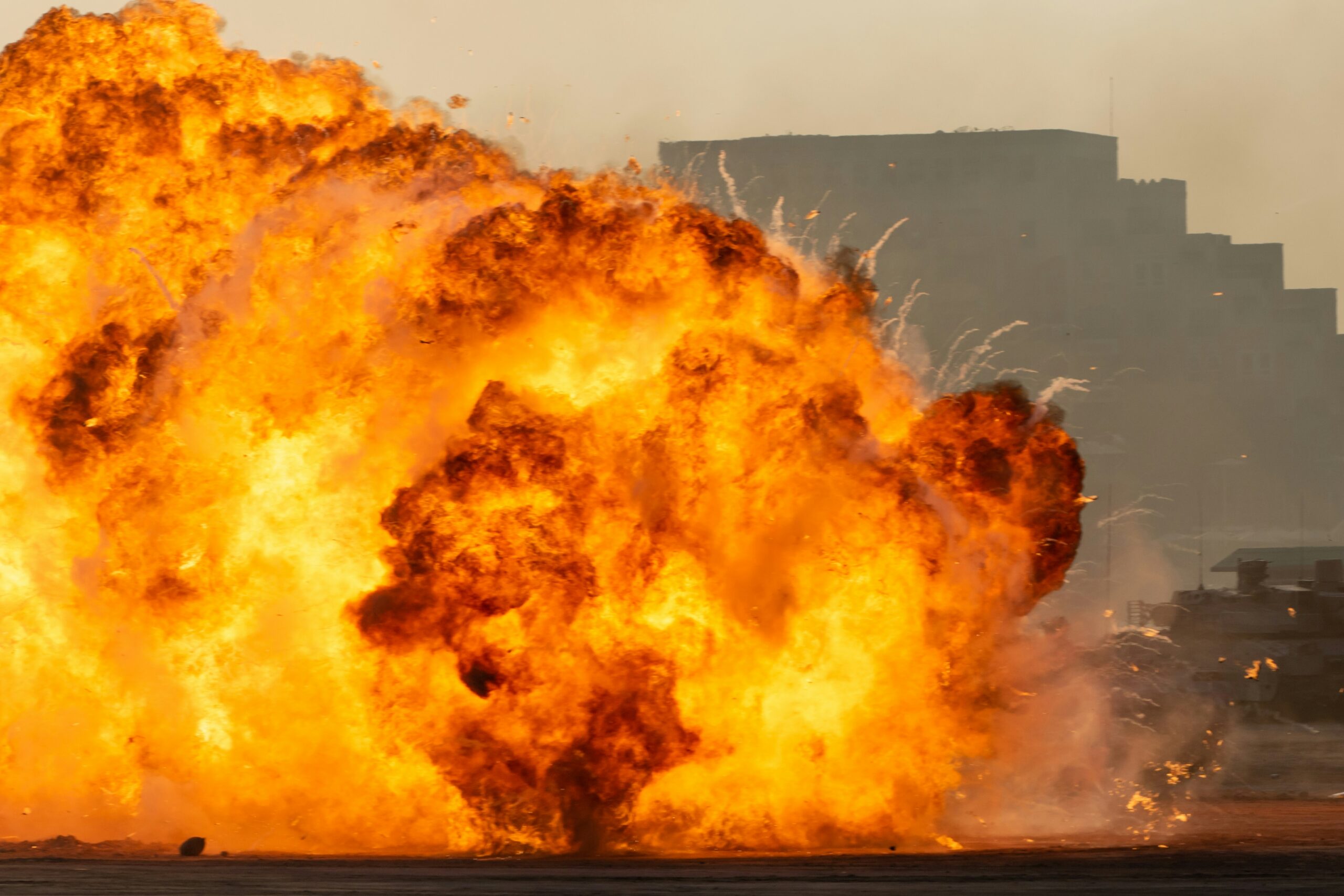 a large explosion with smoke and flames